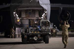 U.S. Airmen with the 60th Aerial Port Squadron and 8th Airlift Squadron